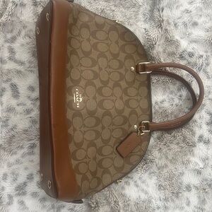 Signature coach bag like new waiting for you to wear all summer long.